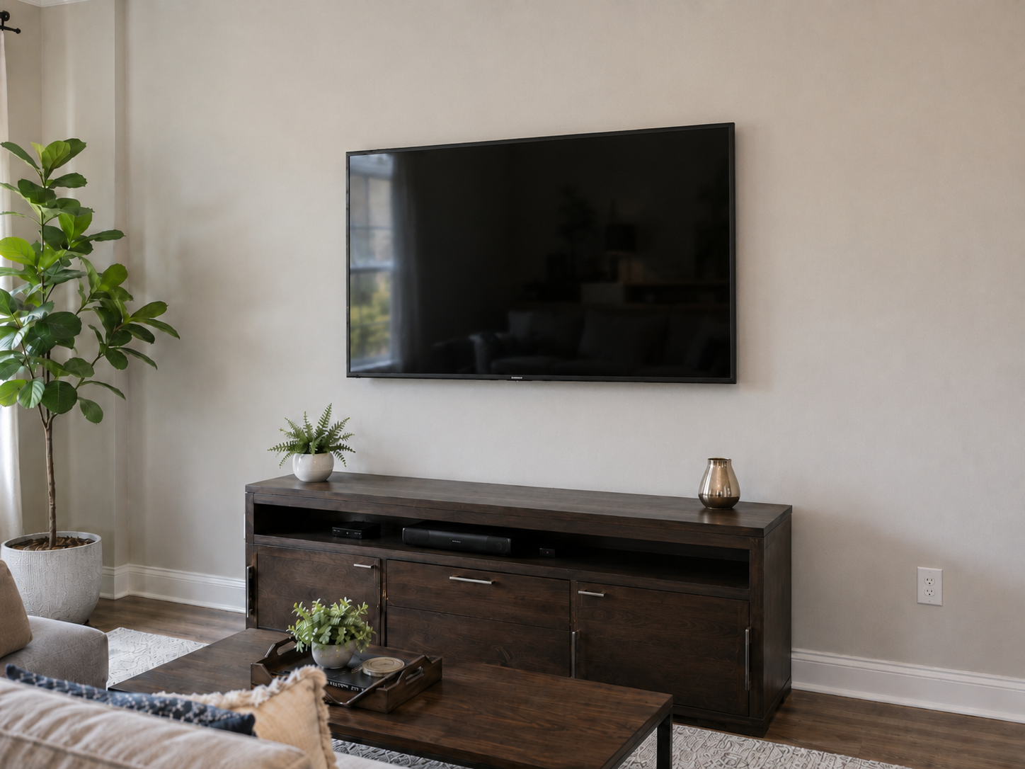 Completed wall-mounted TV in the same living room